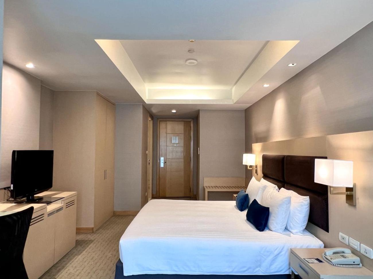 Habitación Doble Deluxe con cama extragrande y vistas a la ciudad